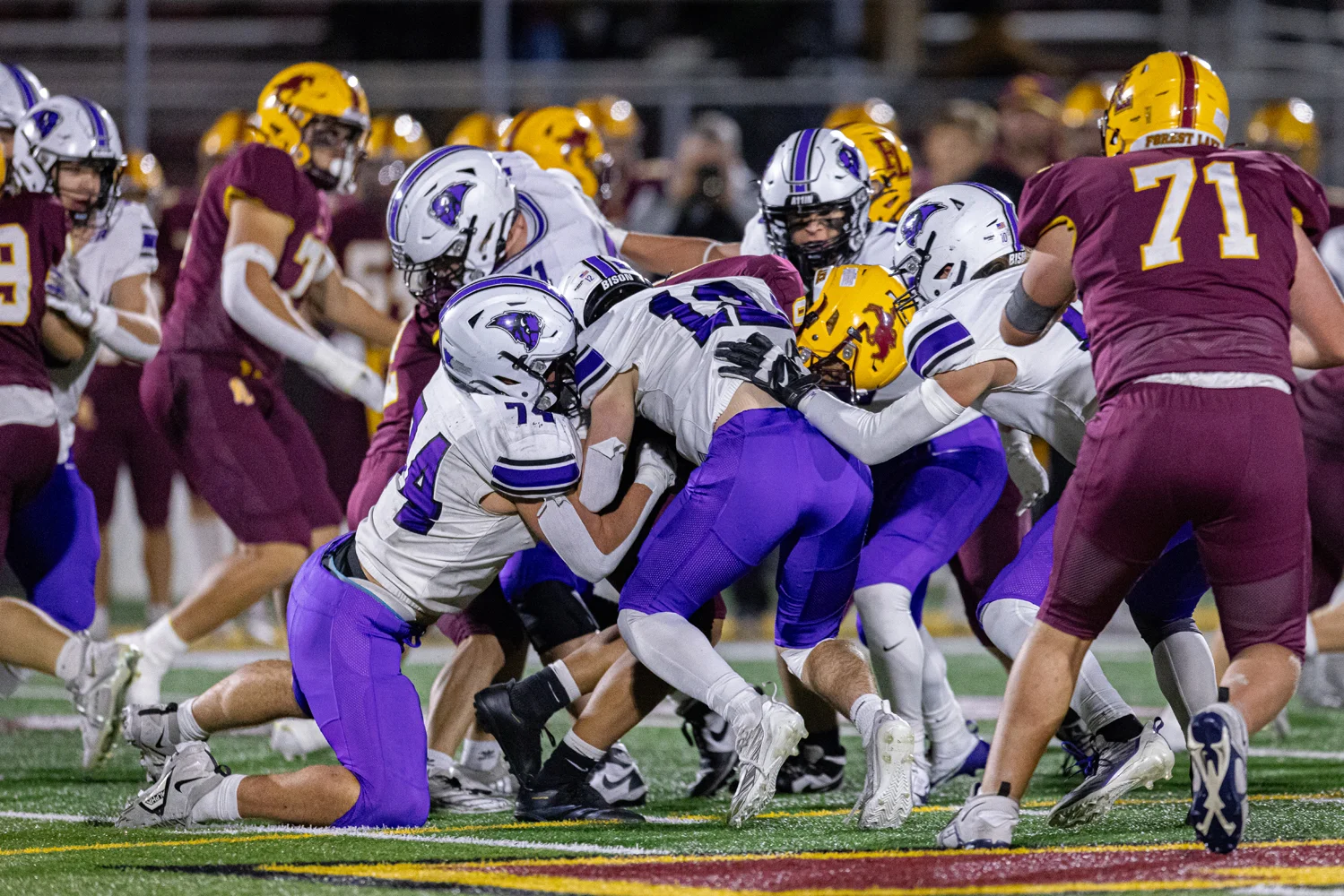 Buffalo defenders making the tackle
