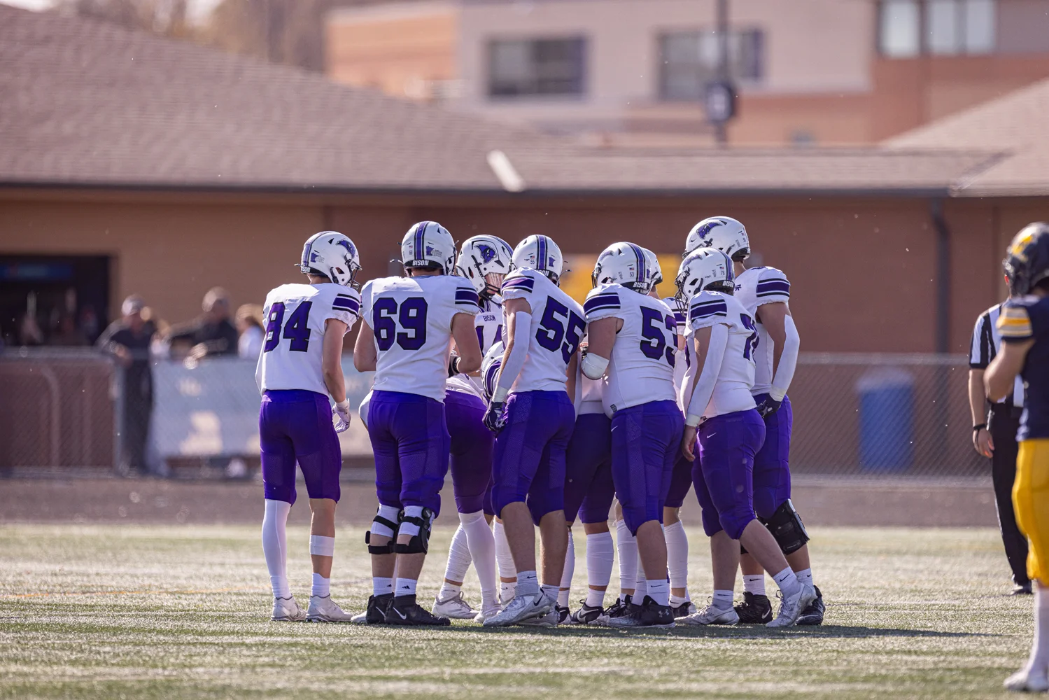 Buffalo Offensive huddle near the sidelines