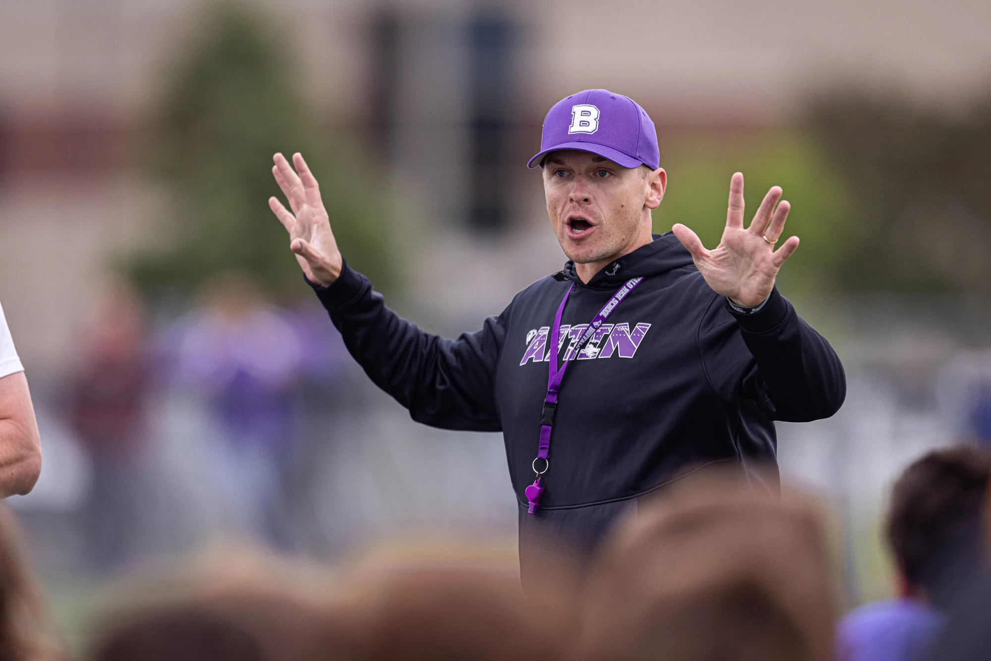 Coach talking to the team